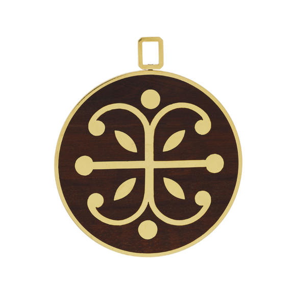 Piguet - H?tel des VentesVan Cleef & Arpels, pendentif circulaire années 1970 or 750 et bois d'amourette décoré du signe du zodiaque du Poisson