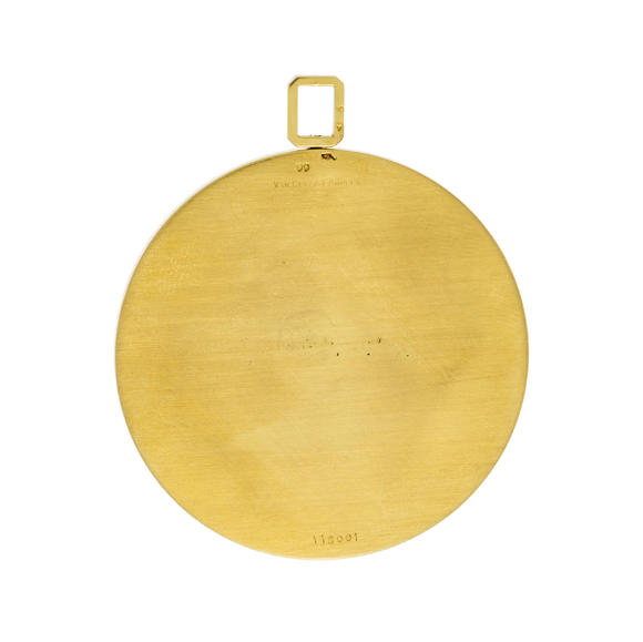 Piguet - H?tel des VentesVan Cleef & Arpels, pendentif circulaire années 1970 or 750 et bois d'amourette décoré du signe du zodiaque du Poisson