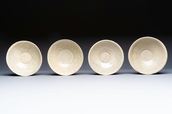 Rob Michiels AuctionsA group of 12 Chinese celadon-glazed bowls with incised floral design from the Jepara shipwreck, Fujian kilns, Song