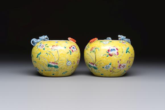 Rob Michiels AuctionsA pair of Chinese famille rose yellow-ground water pots with floral design and applied chilong and bats, Qianlong mark, 19/20th C.