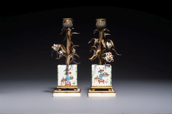 Rob Michiels AuctionsA pair of gilt silver and metal candlesticks with Chinese porcelain, European porcelain flowers, and marble bases, marked Boin-Taburet, late 19th C.