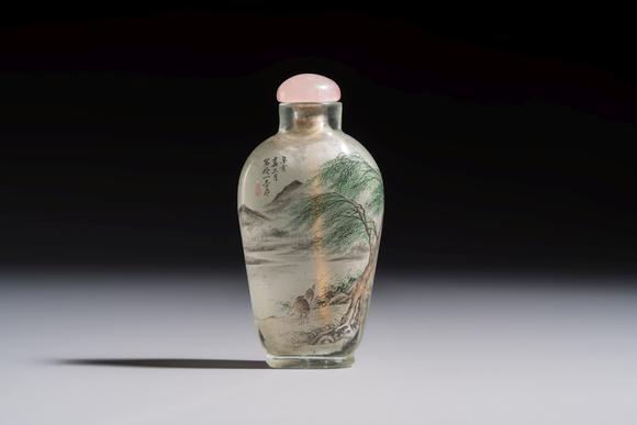 Rob Michiels AuctionsA Chinese inside-painted glass snuff bottle with two men wearing straw raincoats, dated 1911