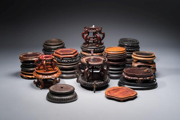 Rob Michiels AuctionsA collection of 40 mainly Chinese wooden stands, 19/20th C.