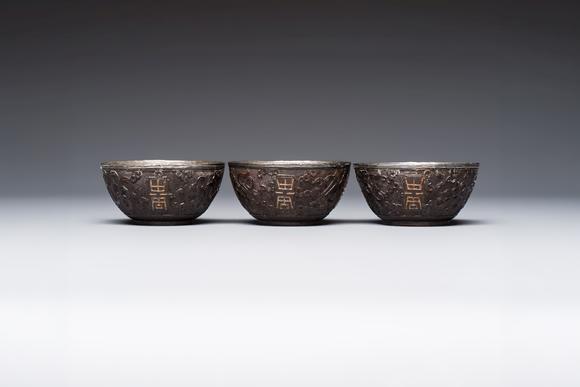 Rob Michiels AuctionsA group of 12 Chinese silver-lined coconut 'Shou 壽' bowls and cups, Wang Hengxin 王恆馨 marks, 19/20th C.