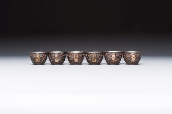 Rob Michiels AuctionsA group of 12 Chinese silver-lined coconut 'Shou 壽' bowls and cups, Wang Hengxin 王恆馨 marks, 19/20th C.