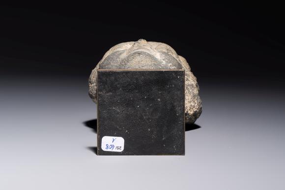 Rob Michiels AuctionsA Gandhara grey schist relief fragment of a Bodhisattva head, 3rd/4th C.