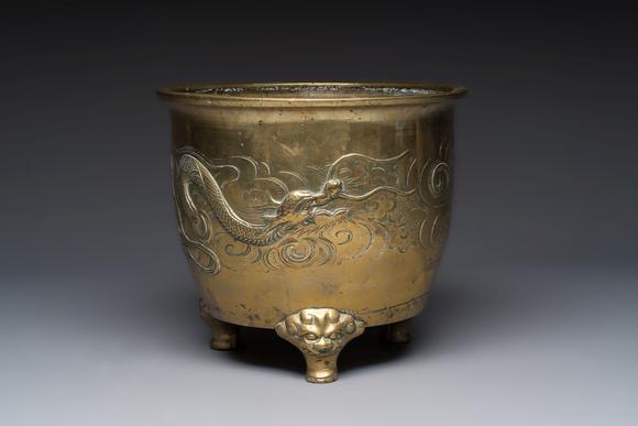 Rob Michiels AuctionsA large Chinese bronze 'Dragon' tripod censer, 19th C.