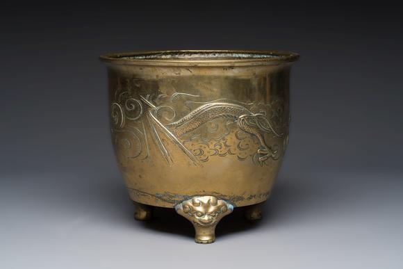 Rob Michiels AuctionsA large Chinese bronze 'Dragon' tripod censer, 19th C.
