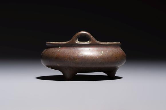 Rob Michiels AuctionsA Chinese bronze handled tripod censer, Yu Tang Jing Wan 玉堂精玩 mark, 17th C.