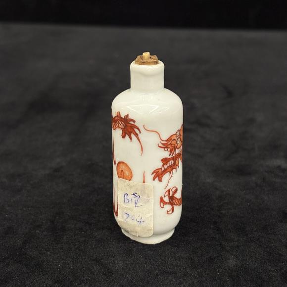 南京十竹齋礬紅龍紋煙壺兩件