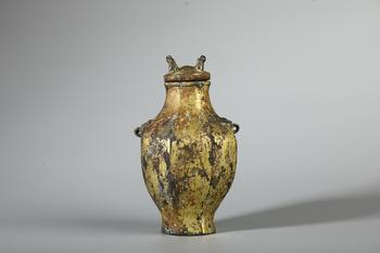A Gilt Bronze Covered Miniature Vase with Twin Looped Handles, China, Han Dynasty