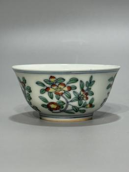 A Doucai Camellia Floral Bowl, Double Blue Line Foot Rim, China, 18th century