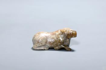 A Calcified Jade Recumbent Buffalo, China, 2nd–1st centuries BCE