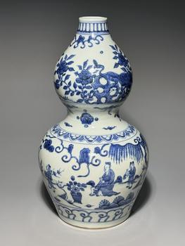 A Blue and White Double-Gourd Vase with Sages, Peacock and Floral Landscape Panels, China, 14th–17th century