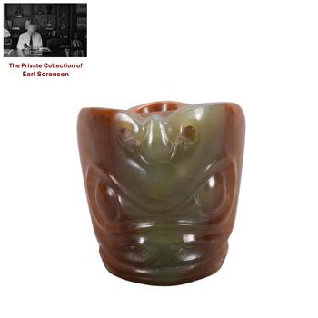 A CHINESE ARCHAIC JADE BEAST MASK BEAD