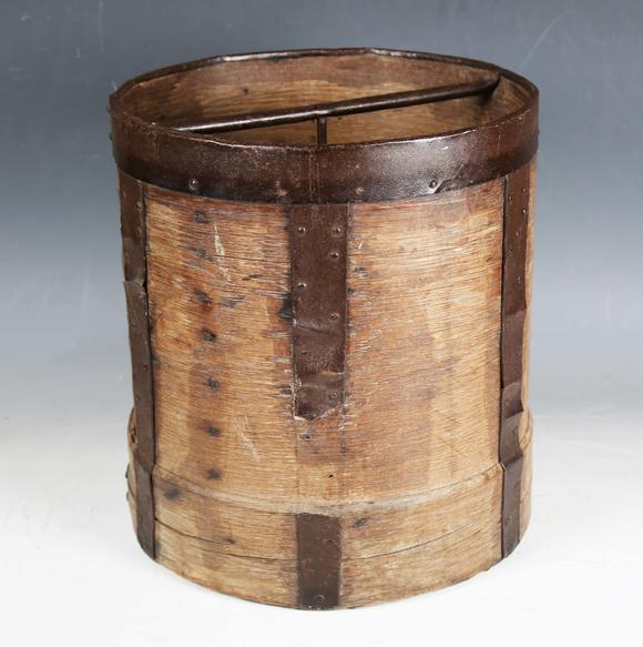 Tooveys|中西方古董藝術(shù)A 19th century French bentwood and metal bound grain measure, the underside stamped 