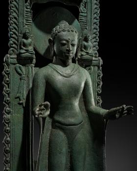 ? A LARGE AND HIGHLY IMPORTANT BRONZE FIGURE OF THE ENTHRONED BUDDHA, SRIVIJAYA EMPIRE, SUMATRA, 8TH-10TH CENTURY