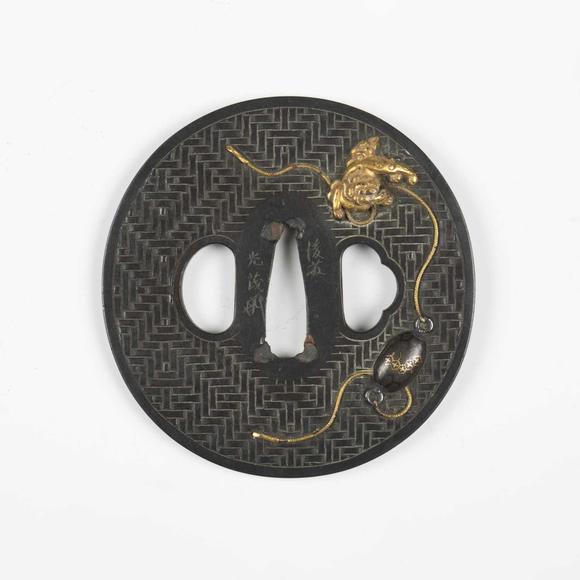 TooveysA very fine Japanese oval shakudo-inlaid bronze tsuba, Edo p