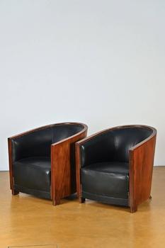 A pair of Art Deco armchairs with leather (*)…