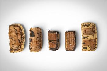 Ca. 20th century AD. >
A group comprising five negbe, each incised with linear and abstract motif