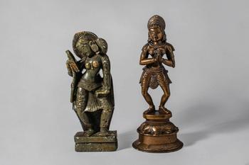 Ca. 19th-20th century AD.
A group comprising two figures: one bronze, depicting a standing female