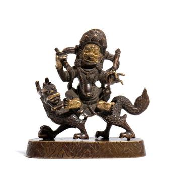 Partially gilded copper Caishen figure. China, late Qing Dynasty - Republic period (1912-1949).