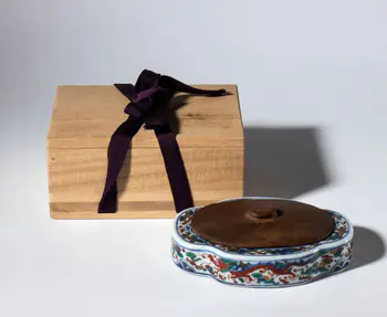 Wucai porcelain inkwell with wooden lid. Comes with its own wooden box. China, late 19th century.