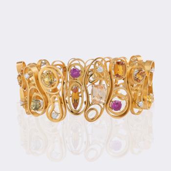 Baltensperger est. 1878 Zurich. Rare vintage gold bracelet with multicolored sapphires.