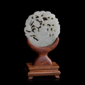 十九世紀(jì)早 白玉鏤雕童子佩（附木座）  A Chinese reticulated white jade 'boy' plaque