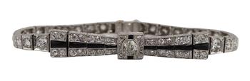 JEWELRY. Art Deco Platinum, Diamond and Onyx