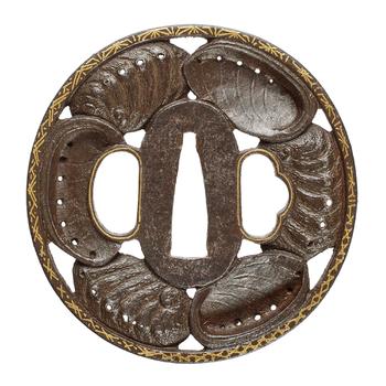 An iron tsuba. 18/19th century