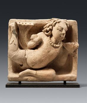 A rare Gupta terracotta relief tile with a vidyadhara. Eastern India. 5/6th century