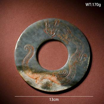 Pre-Ming Dynasty Cinnabar-Infiltrated Dragon- Pattern Jade Bi Disc