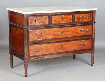 A late 18th century French Louis XVI period satinwood three-drawer c
