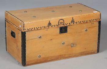 A 19th century pine and brass studded trunk, height 39cm, width 76cm