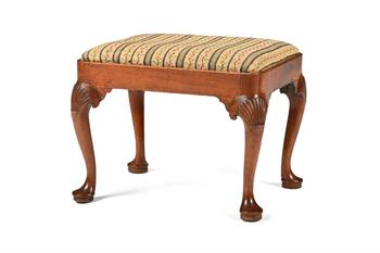 A GEORGE II WALNUT AND UPHOLSTERED STOOL, CIRCA 1740