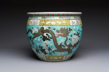 A Chinese famille rose turquoise-ground Dayazhai-style 'Dragons' fish bowl or jardinière, 19th C.
