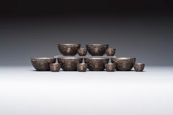 A group of 12 Chinese silver-lined coconut 'Shou 壽' bowls and cups, Wang Hengxin 王恆馨 marks, 19/20th C.