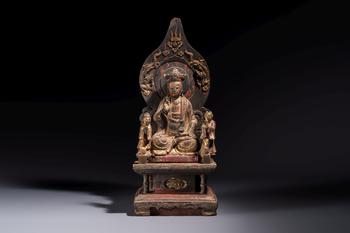 A Chinese gilt-lacquered wooden Bodhisattva and attendants on a throne, Qing