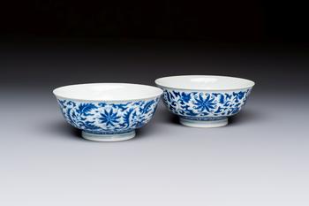A pair of Chinese blue and white 'lotus scroll' bowls, Yongzheng mark and of the period