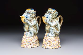 A pair of polychrome Dutch Delft monkey ewers and covers, 18th C.