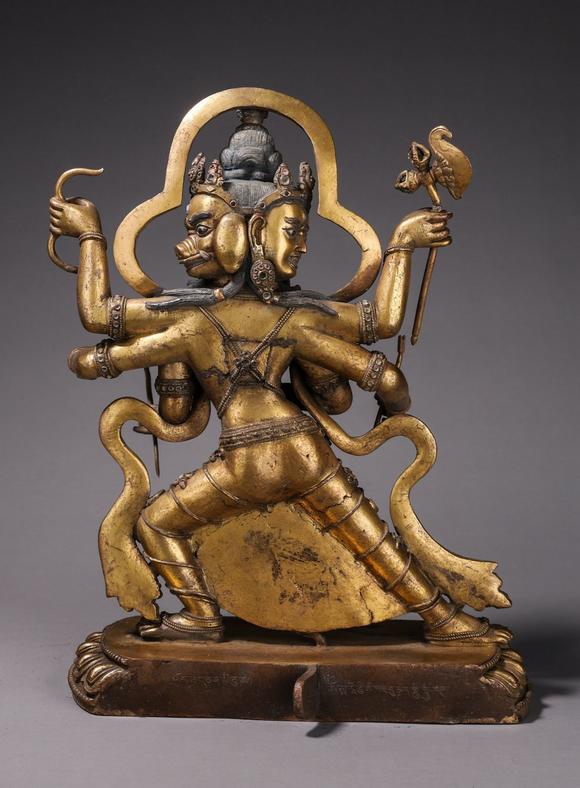 铜鎏金三头六臂佛像