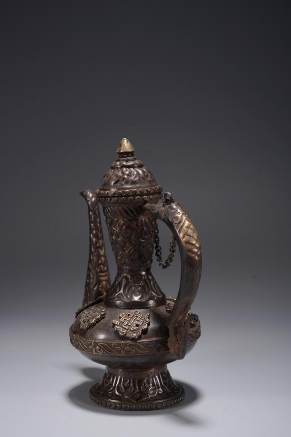 清藏传局部鎏金铜执壶