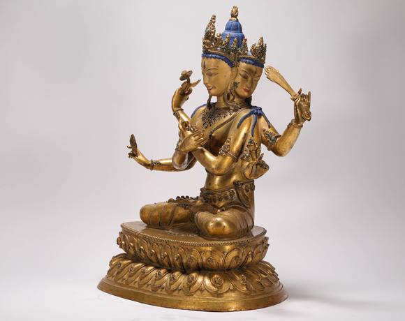 liaodu art auction清代铜鎏金三头六臂佛造像  a bronze gilt three