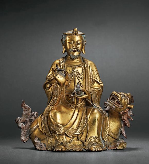 明铜鎏金男相骑吼观音坐像